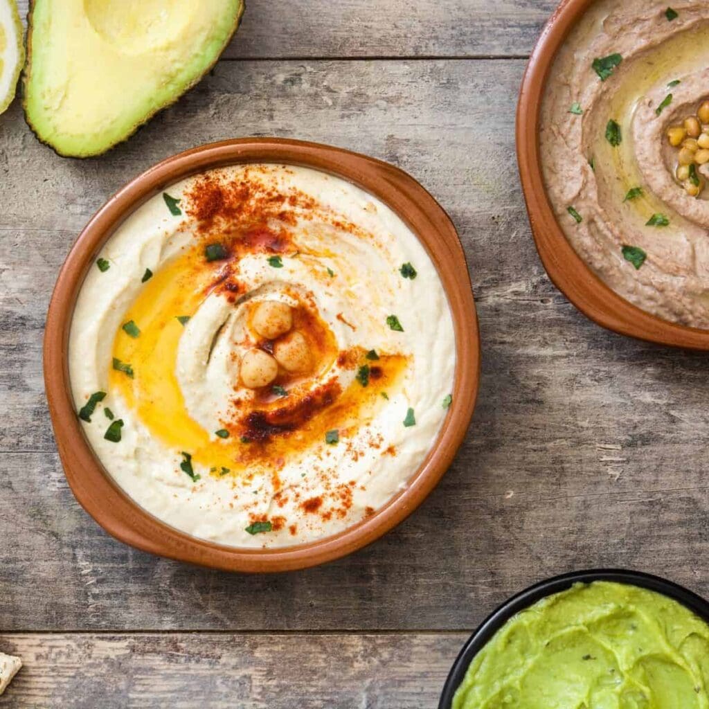 What is hummus and how do you serve it?