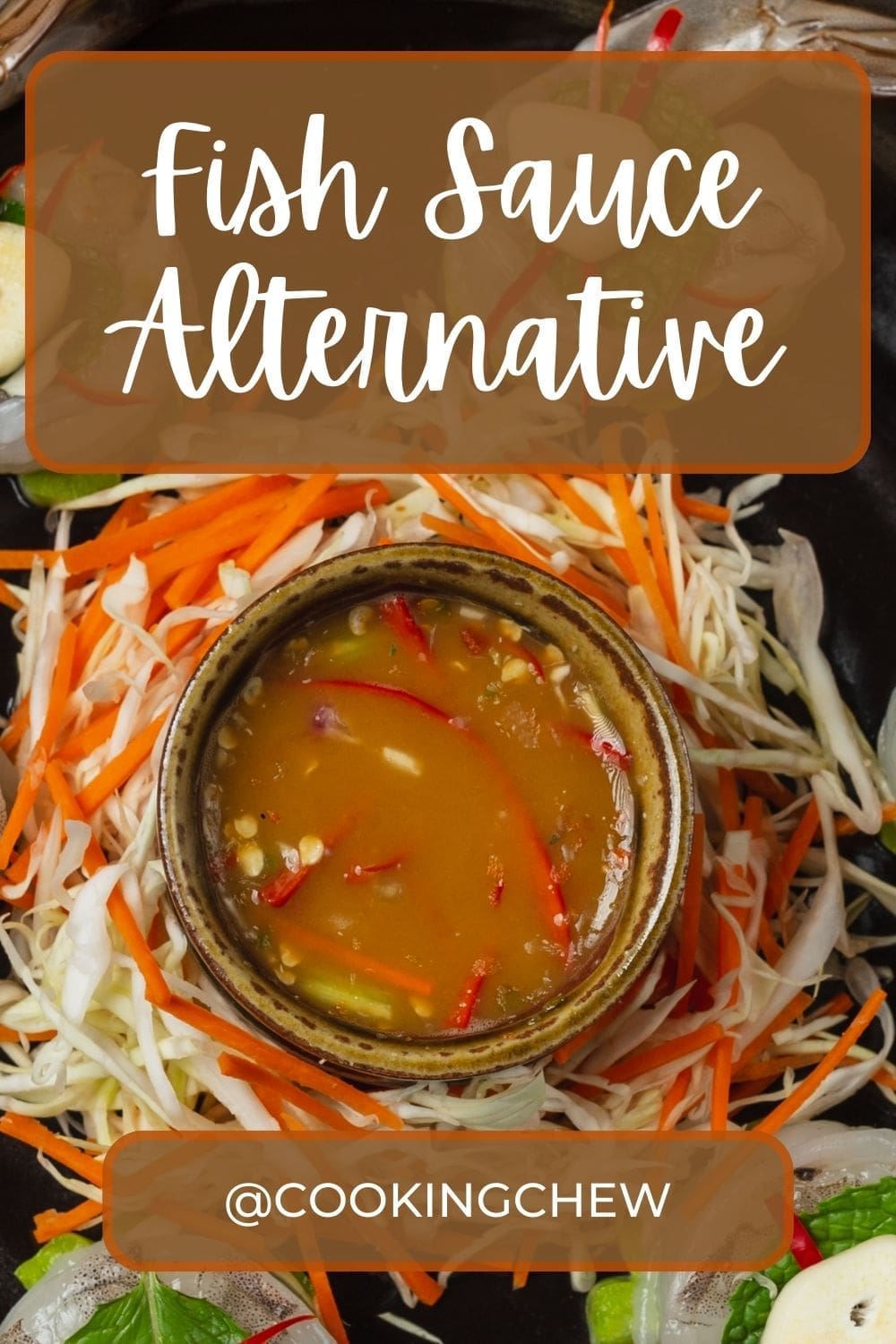 A bowl of fish sauce surrounded by sliced carrots, radishes, cucumber, and herbs, on a white plate.