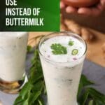 A close-up photo of a glass of buttermilk on a wooden table.
