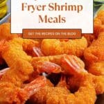 A plate of golden breaded shrimp arranged on a plate.
