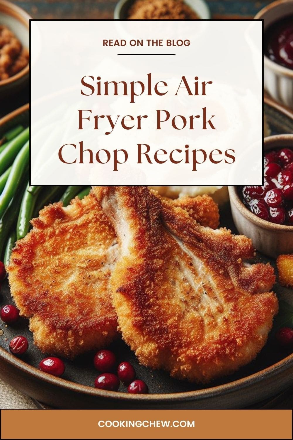 A photo of a plate of air-fried pork chops with cranberry sauce and green beans on a rustic wooden table. 