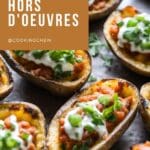 An image of vegan potato skins on a wooden plate.