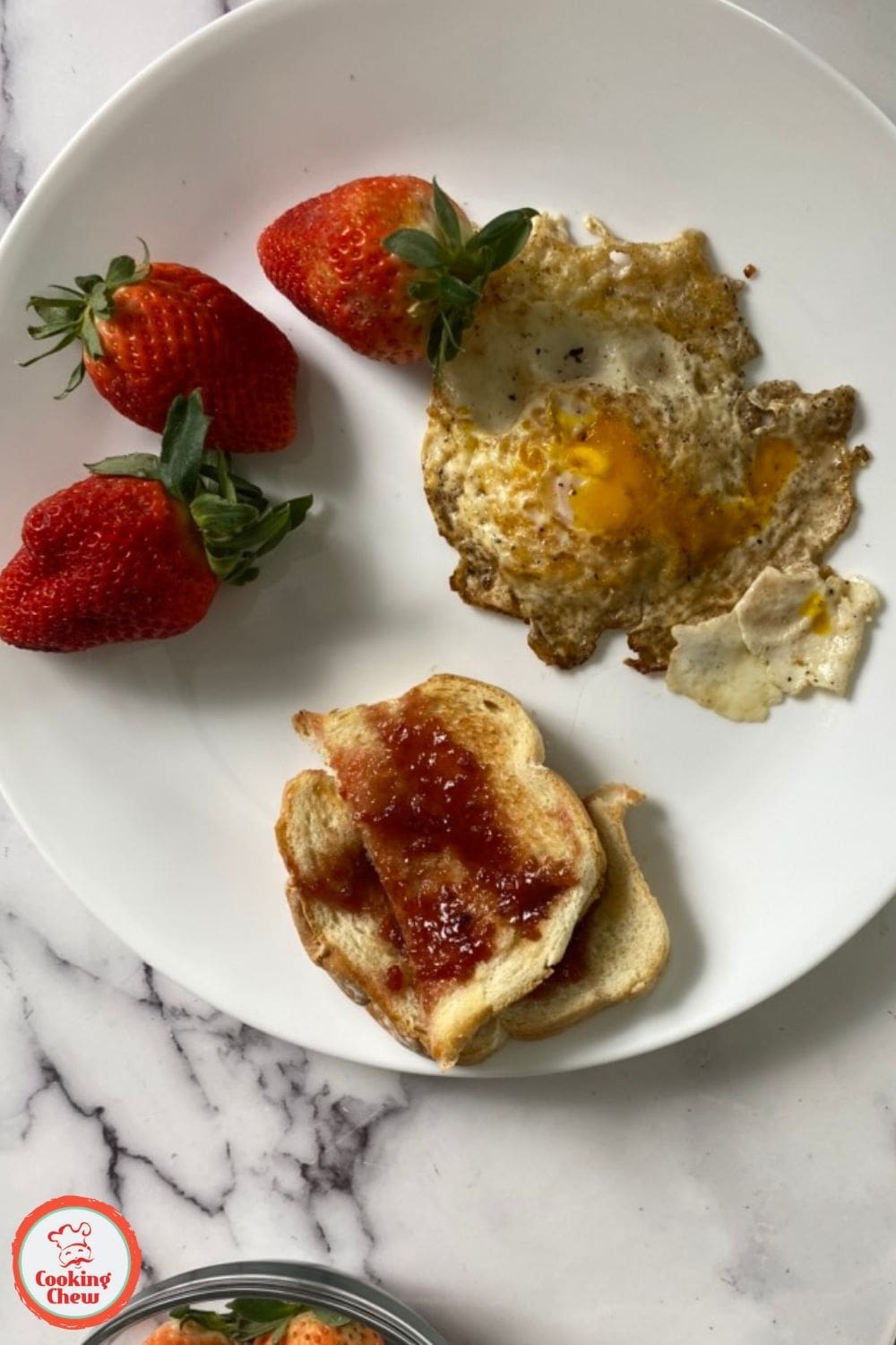 Soft, fluffy scrambled eggs in a cast iron pan, ready to serve for breakfast.