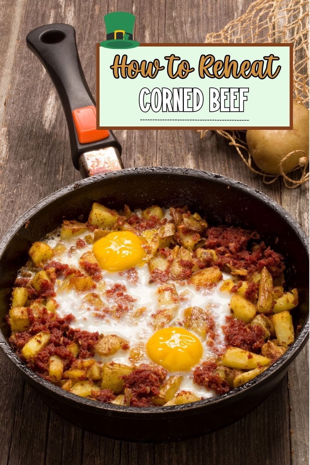 A skillet filled with corned beef and fried eggs. 