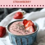 Healthy strawberry chia seed pudding served in a glass jar with a spoon.