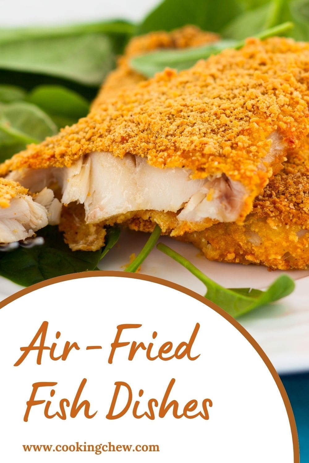 A plate of golden fried fish fillet with a side of leafy greens on a white plate.
