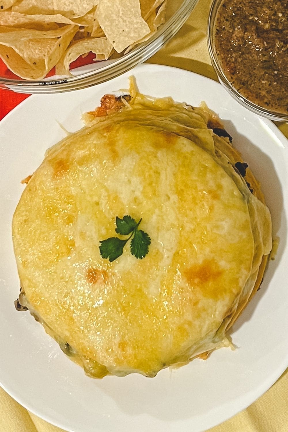 A golden brown mexican tortilla casserole.