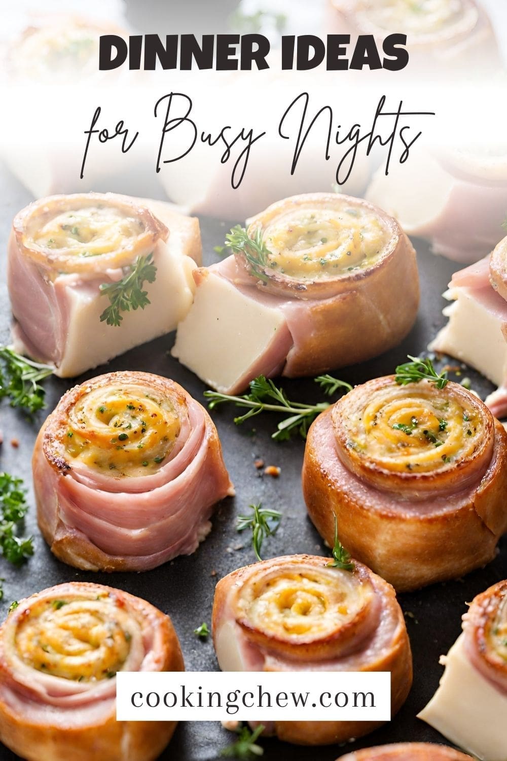 A plate of homemade baked ham and cheese wheels.