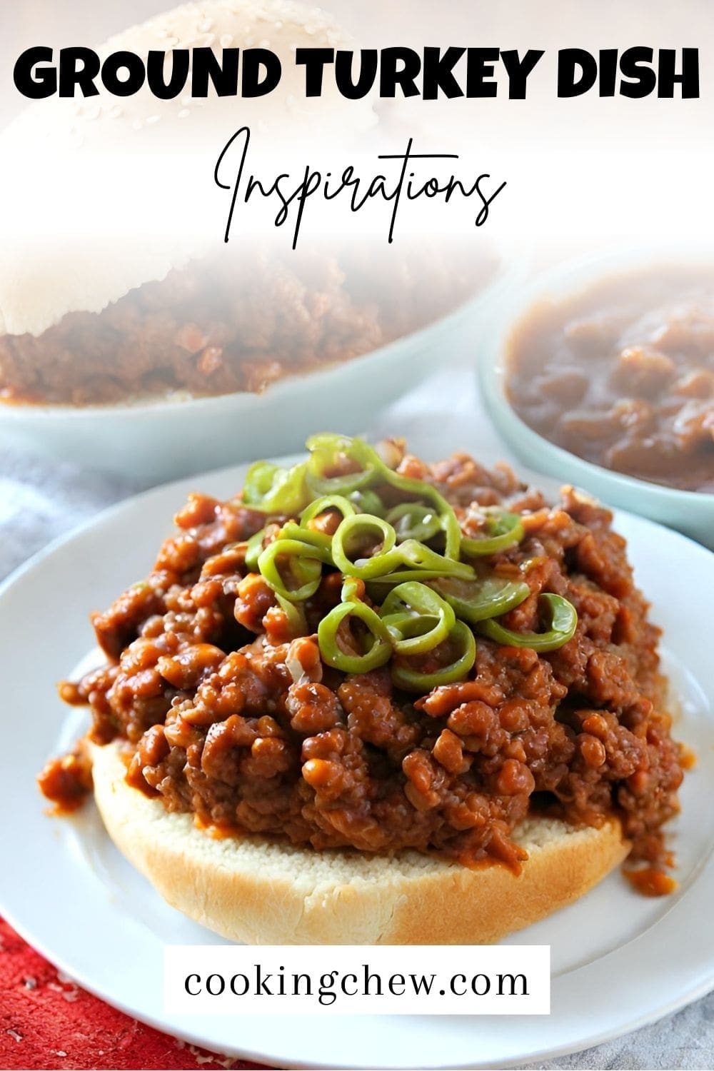 A photo of a plate of ground turkey on a hamburger bun, topped with green onions.