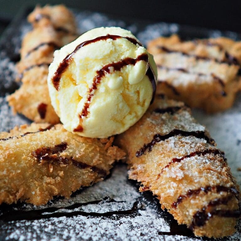 21 BEST Jamaican Desserts: Rock Cake, Bammy, Bulla & More