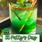 A glass filled with a green st patty’s day drink sits on a wooden table.