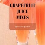 Two glasses of grapefruit juice cocktails with grapefruit slices on top.