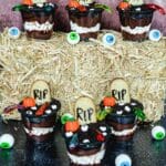 Dirt Pudding Cups Topped with Gummy Worms for Halloween Fun