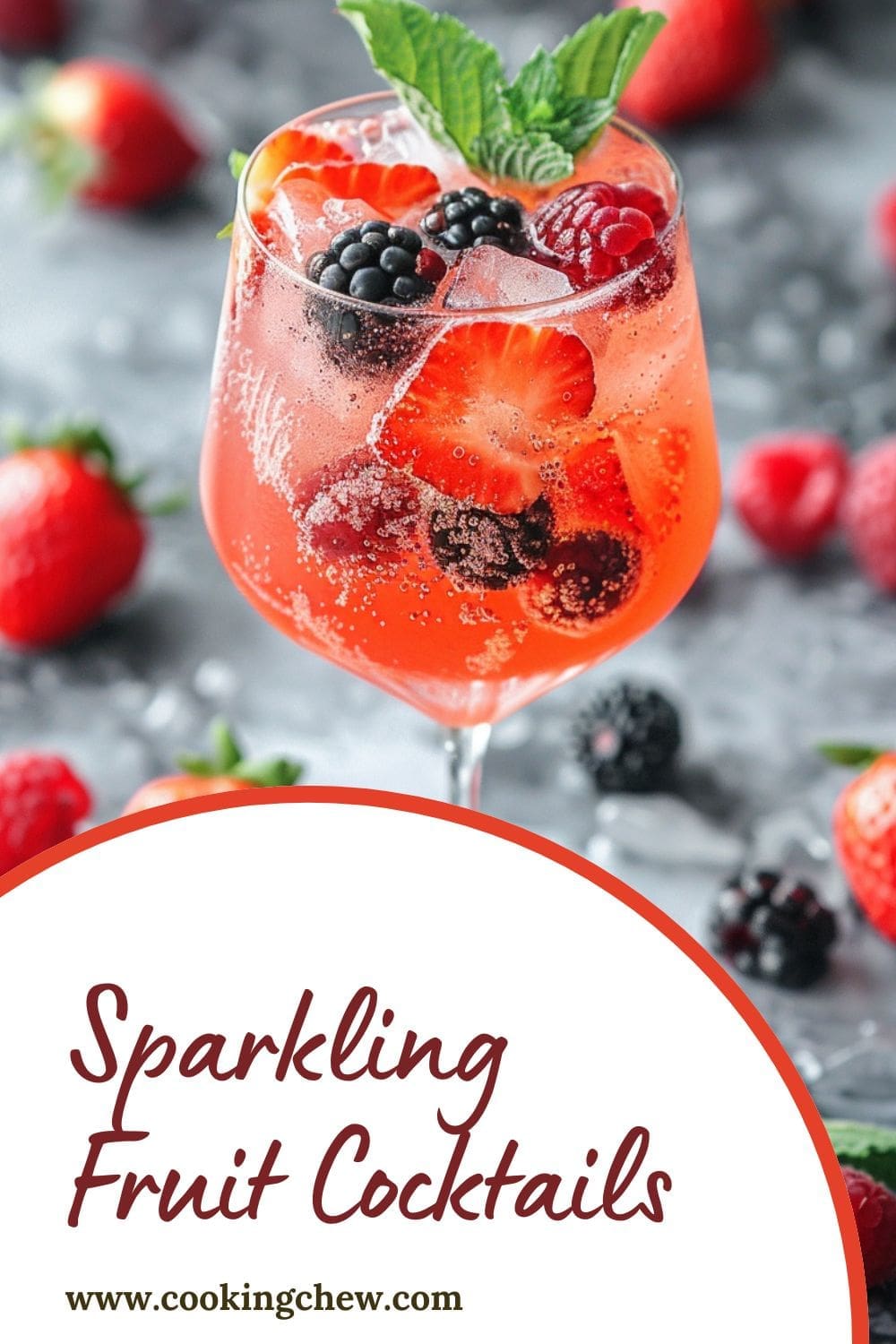 A glass of sparkling fruit cocktail with strawberries, blackberries, and raspberries.
