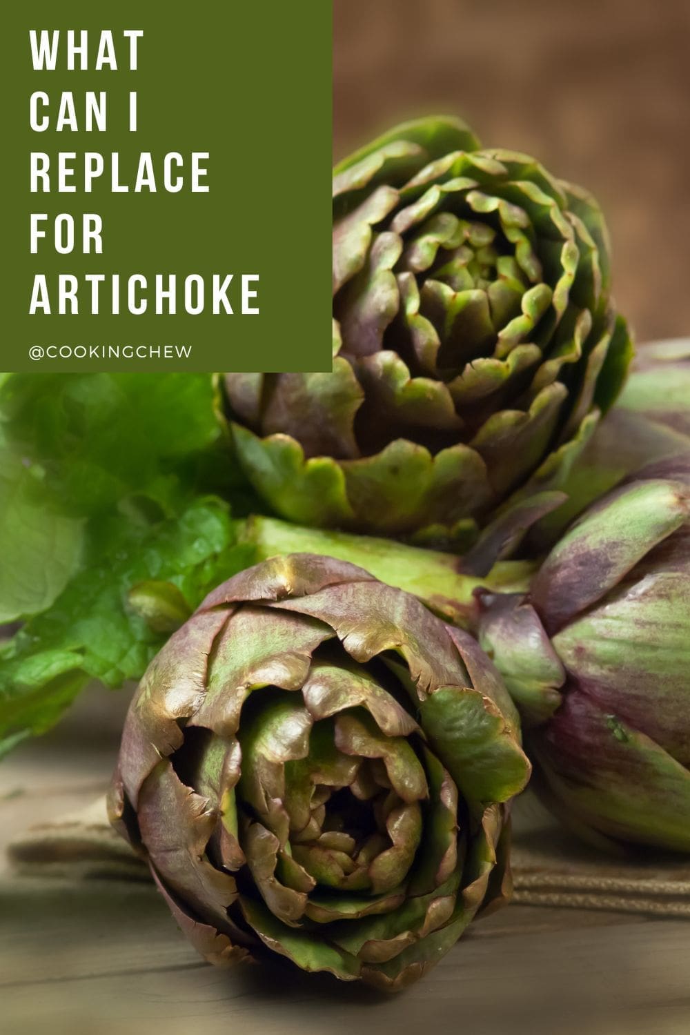 A photo of artichokes on a wooden table.