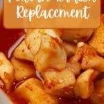 A photo of a bowl of Korean radish kimchi.