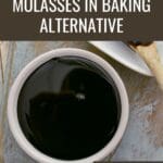 Close-up of a bowl of molasses on a cutting board.