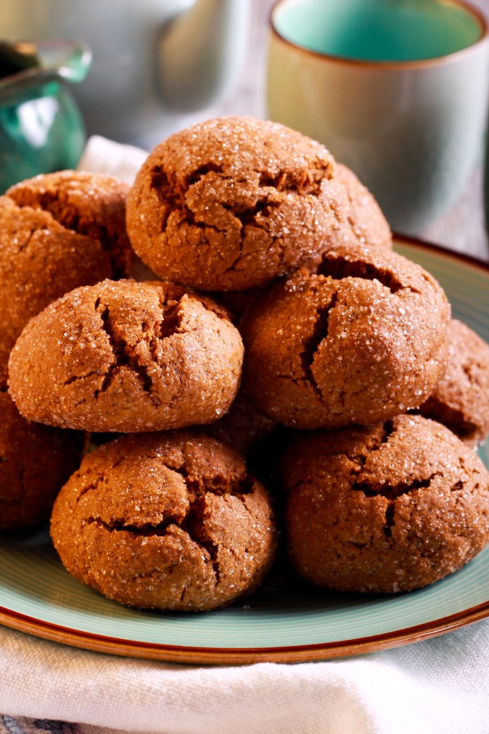 Molasses cookies coated with sugar on a plate