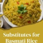 A photo of a plate of basmati rice with cilantro on top.