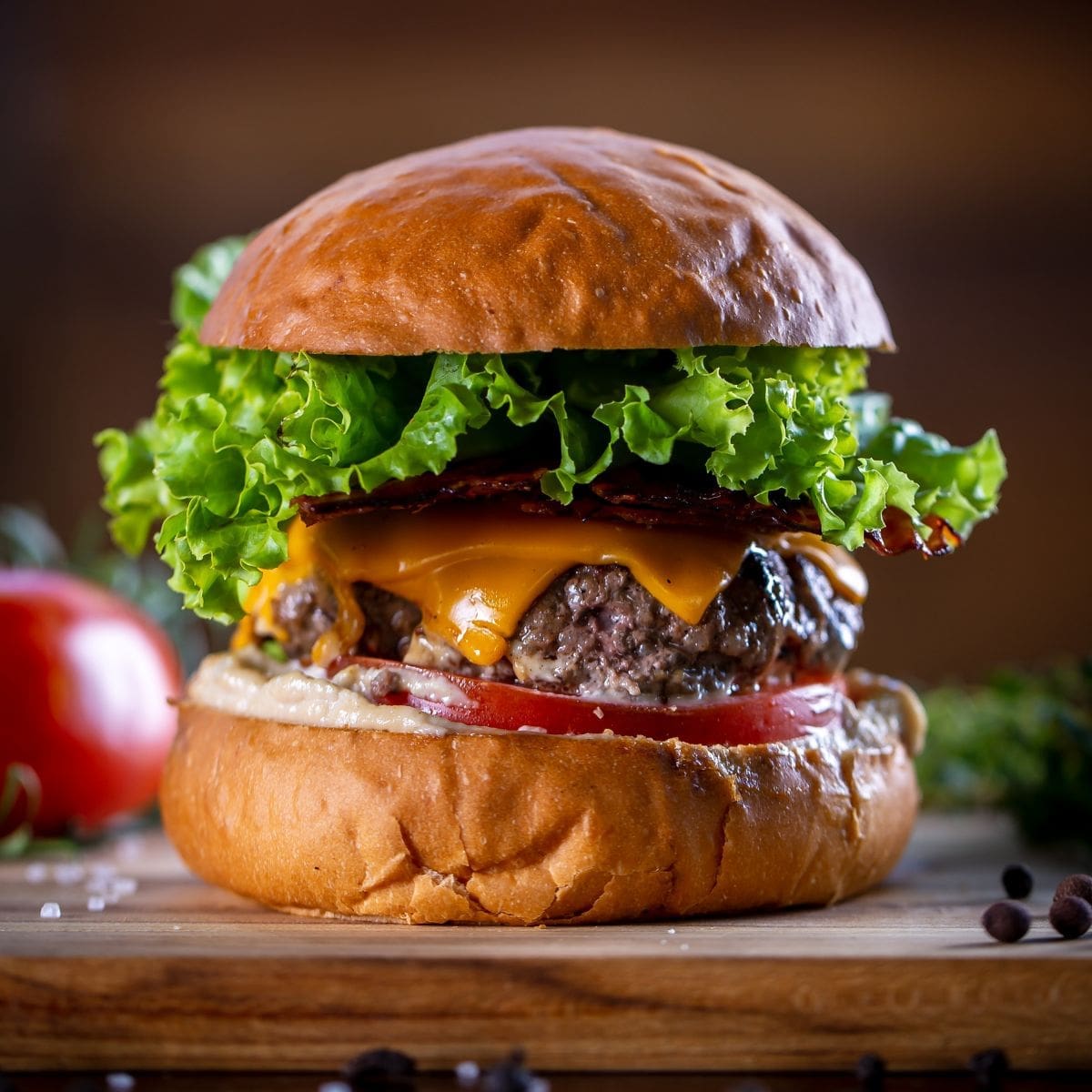 A close-up photo of a mouthwatering burger, its juicy patty overflowing with a symphony of flavors, complemented by the unexpected crunch of Funyuns.