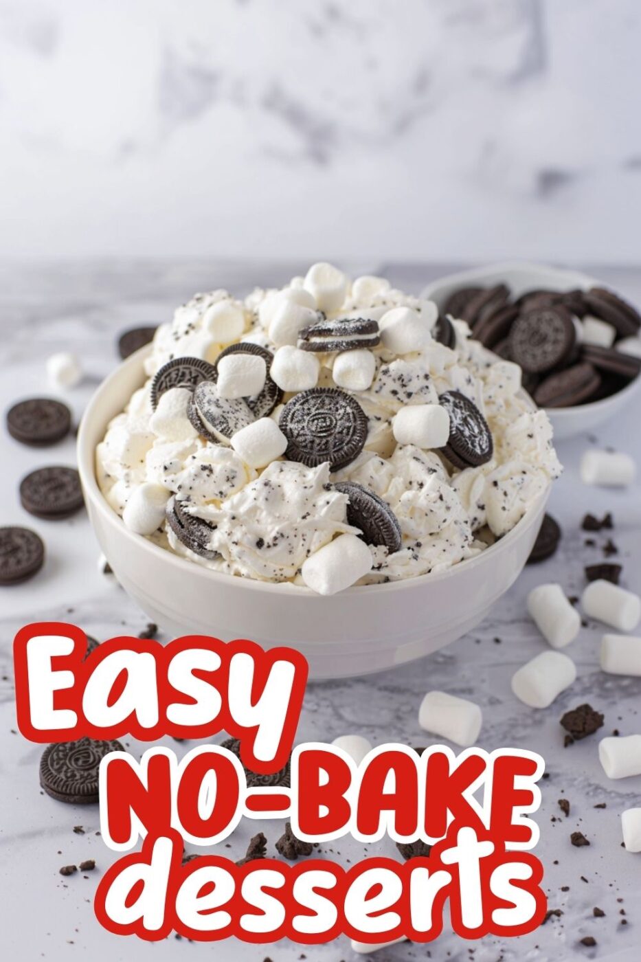Creamy mound of white fluff containing marshmallows and pieces of mini OREO cookies