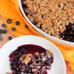 Delicious blueberry maple crisp with a crispy topping and fresh blueberries.
