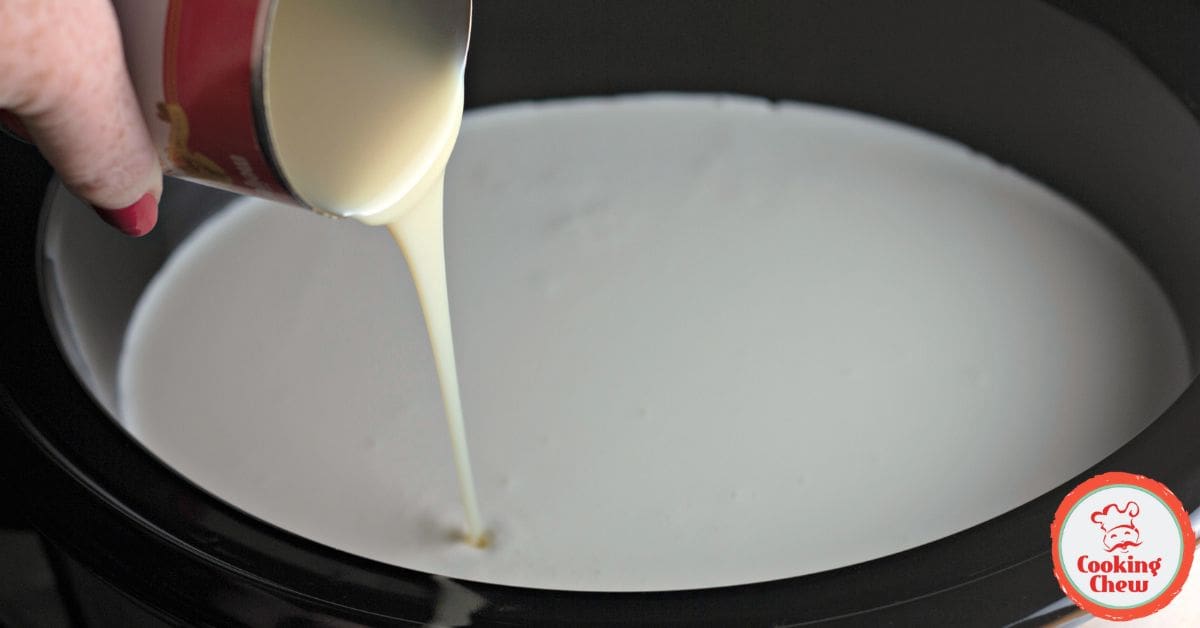 Boozy pumpkin white hot chocolate in the slow cooker.