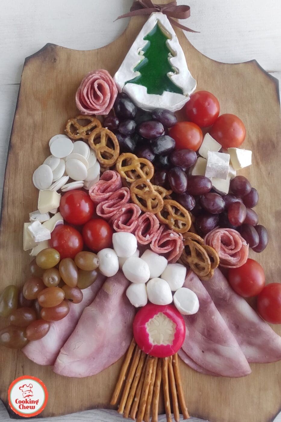 Christmas charcuterie board filled with snacks for a holiday party