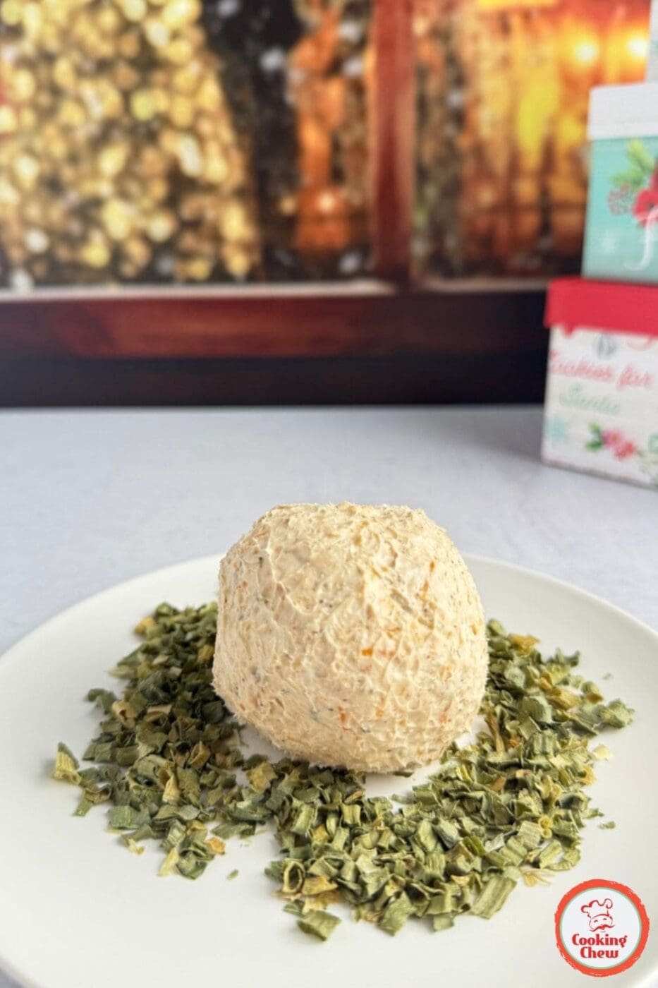 Holiday cheese ball recipe shaped like a Christmas ornament.