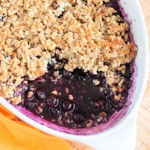 Simple berry crisp recipe with fresh blueberries and maple syrup
