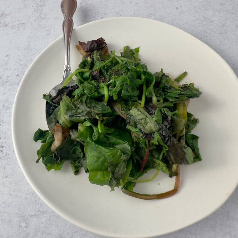A vibrant dish of sautéed baby greens, perfect for a healthy side.