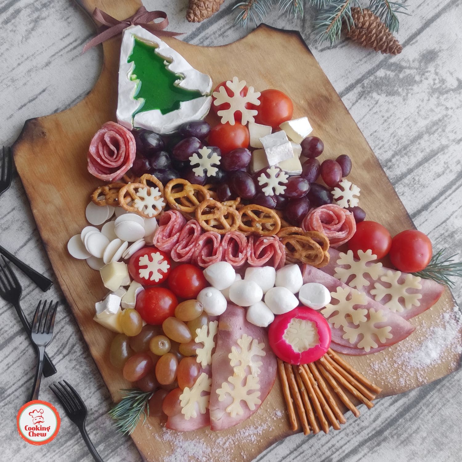 Festive Christmas tree charcuterie board for a holiday gathering