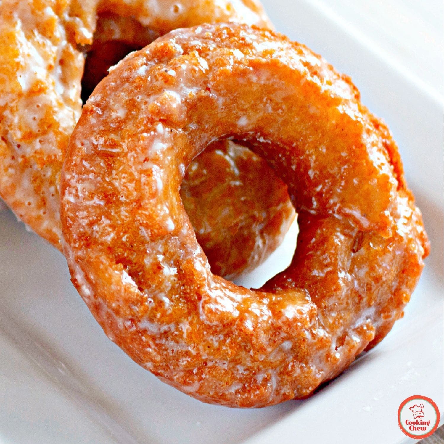 Warm pumpkin spice donuts with vanilla glaze.