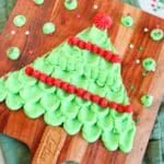 Festive Christmas dessert board with buttercream and sweet holiday treats.
