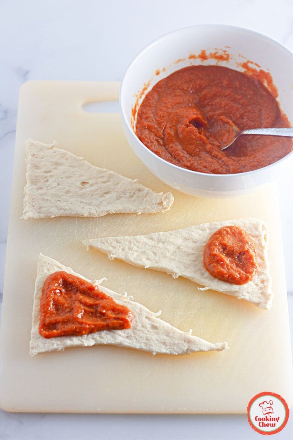 Golden crescent rolls filled with pumpkin spice, perfect for autumn desserts.