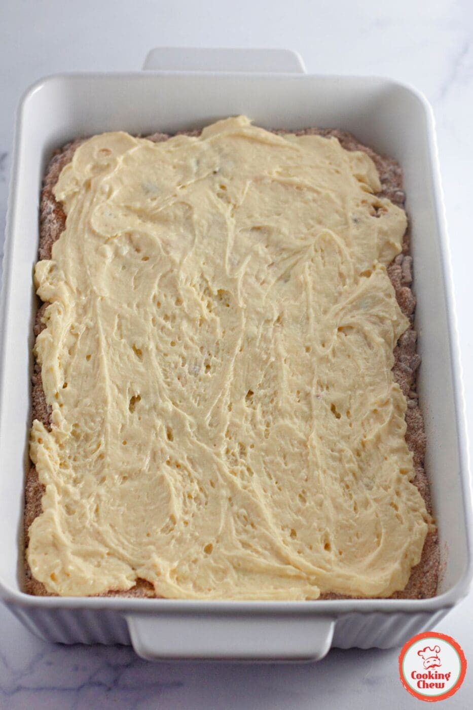 Homemade honey bun cake with a cinnamon swirl and sweet glaze.