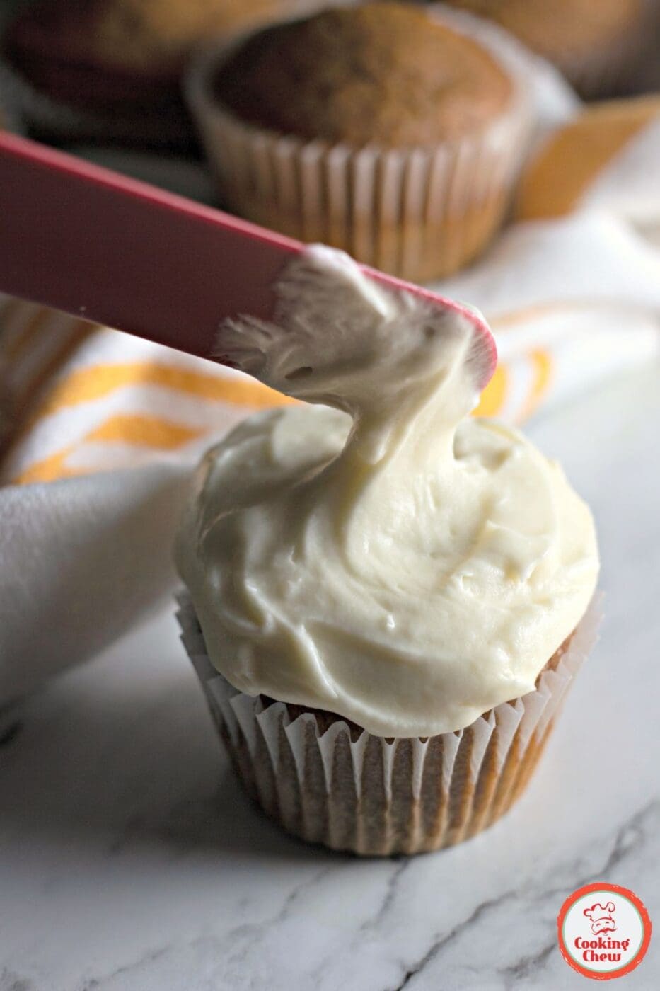 Pumpkin spice cupcakes with cream cheese frosting for any celebration.