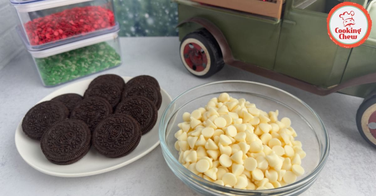 Festive chocolate-covered Oreos decorated for Christmas with holiday sprinkles.