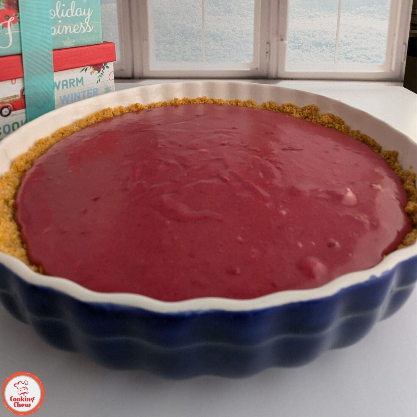Close-up of cranberry curd tart showcasing its smooth filling and golden crust.