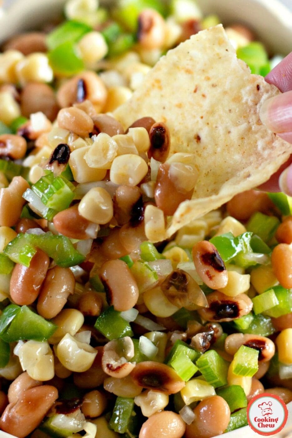 Fresh and healthy cowboy caviar with corn and beans, perfect for dipping.