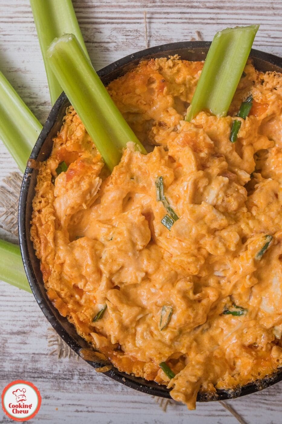 Creamy, spicy Buffalo chicken dip made in a crockpot for a perfect party appetizer.