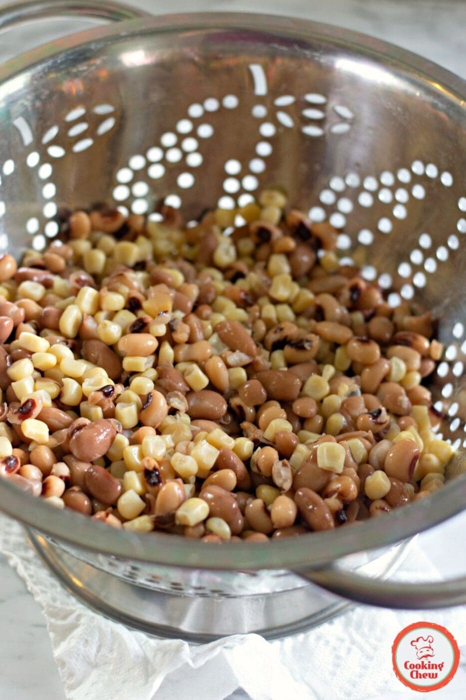 A colorful cowboy caviar with marinated beans, corn, and vegetables served as a versatile appetizer.