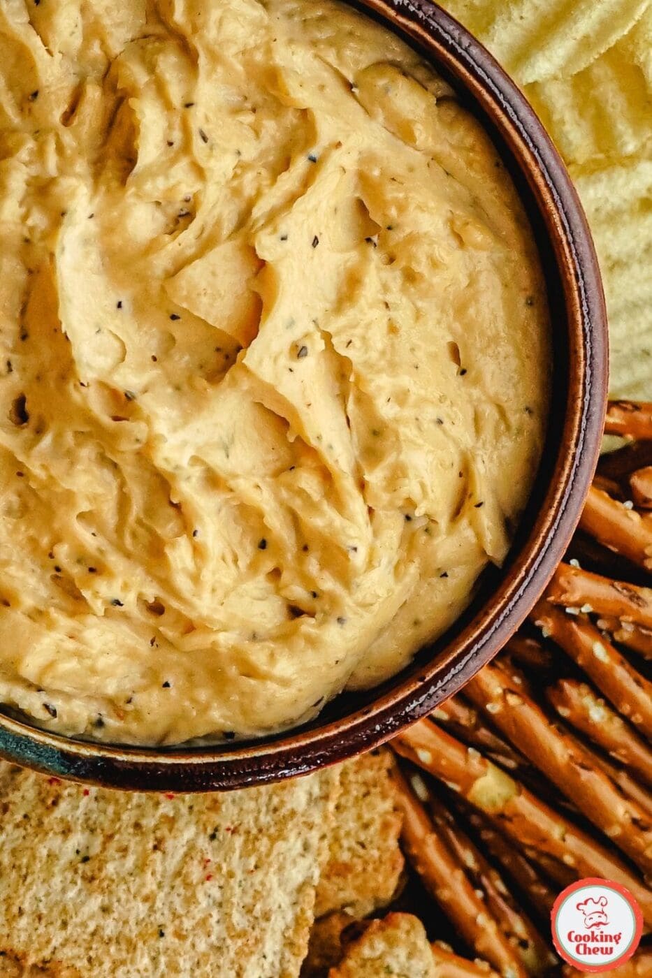 Creamy and spicy beer cheese dip, perfect for parties and snacking.