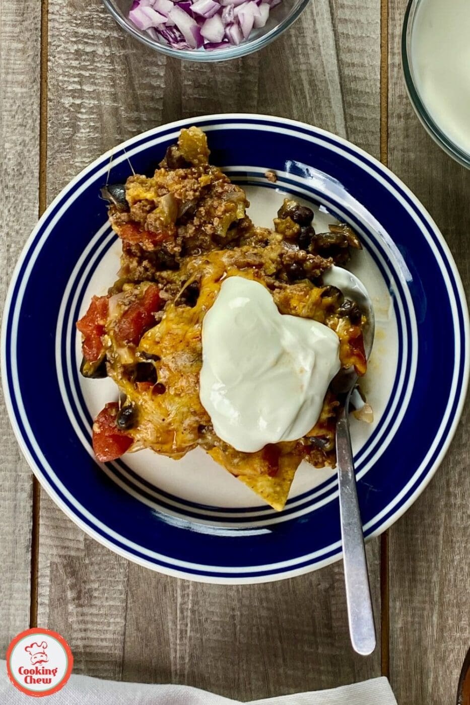 A hearty taco casserole with seasoned ground beef, melted cheese, and classic taco flavors, offering a quick and easy dinner option for busy families.