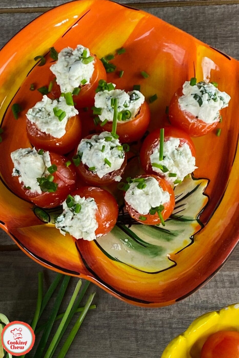 Fresh cherry tomatoes filled with creamy goat cheese, perfect for a healthy, flavorful appetizer or snack.