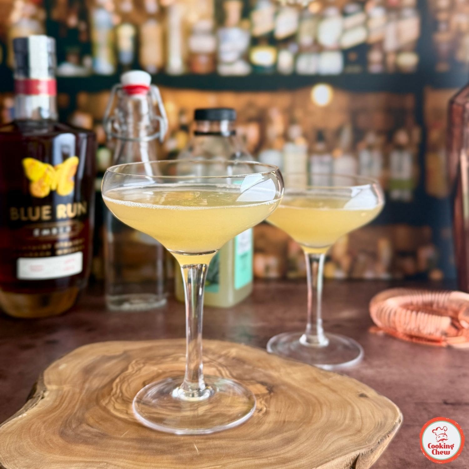 A freshly mixed Whiskey Sour with lime juice, served over ice in a cocktail glass.
