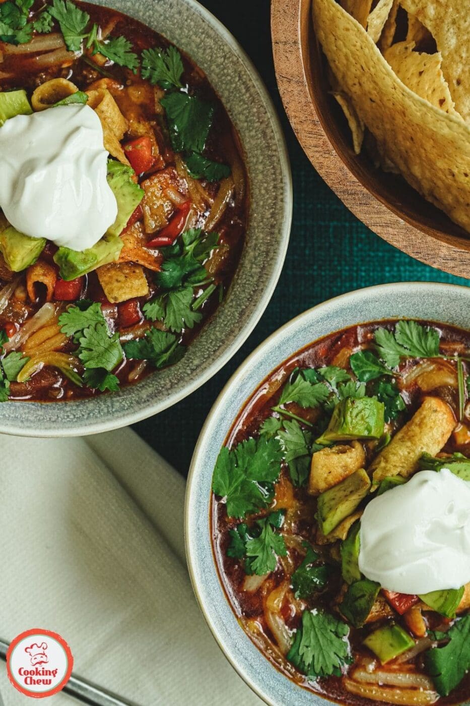 A hearty and flavorful bowl of homemade taco soup with ground beef, beans, and fresh toppings, perfect for a quick dinner.