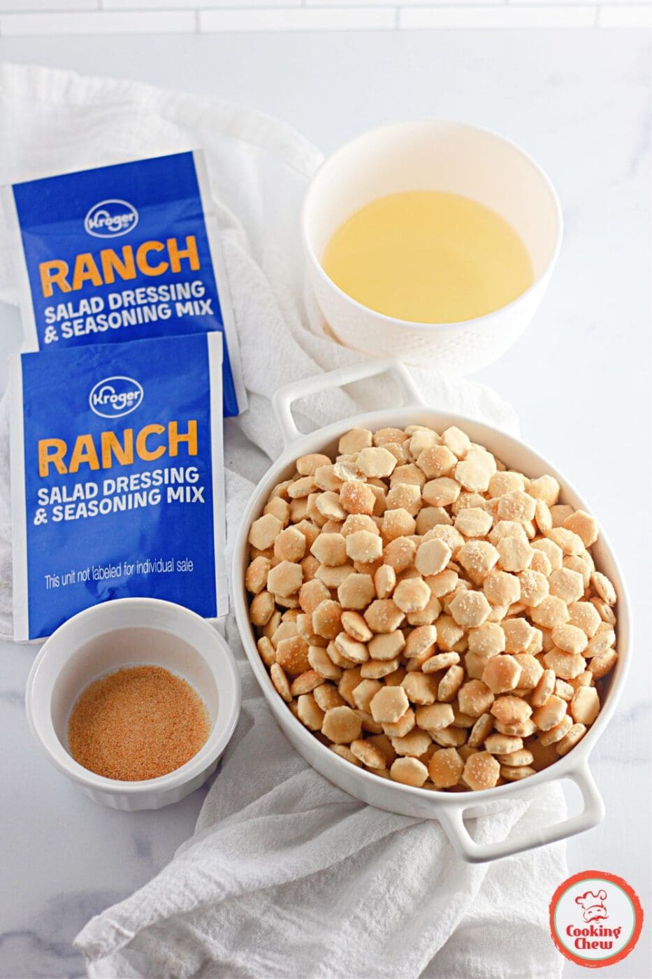 A tray of oven-baked ranch oyster crackers with golden seasoning
