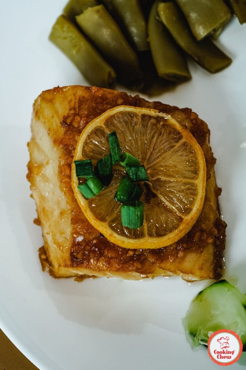 Baked Asian cod with a golden, flaky crust, served with vibrant Asian-inspired flavors. Perfect for a quick and healthy Asian cod dinner.
