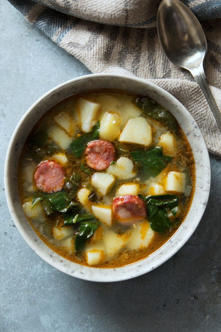A bowl of comforting sausage and potato soup, creamy, hearty, and perfect for a cozy meal on a cold day.